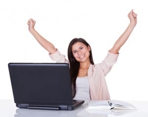 Happy female office worker rejoicing